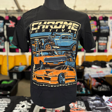 Black t-shirt with car graphic and 'Chrome Festival' text on a mannequin, with a blurred store background.