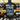 Black t-shirt with car graphics and text on a mannequin in a store setting. Audi RS6 Avant, BMW M3 Touring Competition and Mercedes AMG E63 Wagon/Estate in Blue, Grey and White