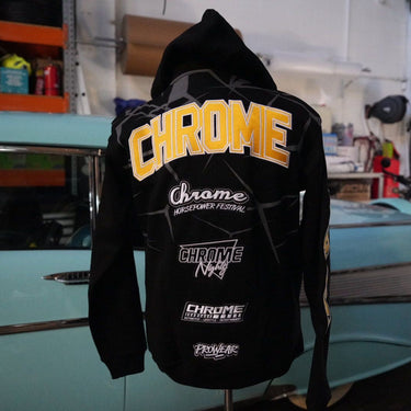 Black hoodie with 'Chrome' branding in a garage setting