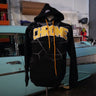 Black hoodie with 'Chrome' text in a garage setting