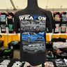 Black t-shirt with car graphics and text on a mannequin in a store setting. Audi RS6 Avant, BMW M3 Touring Competition and Mercedes AMG E63 Wagon/Estate in Blue, Grey and White